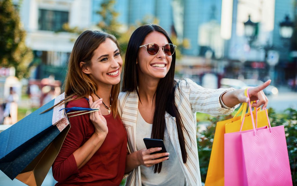 Female friends shopping together